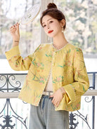 Elegant modern Tang suit short jacket for women featuring jacquard fabric and refined Chinese style