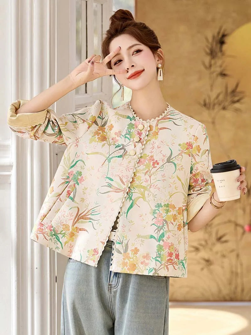 Elegant modern Tang suit short jacket for women featuring jacquard fabric and refined Chinese style
