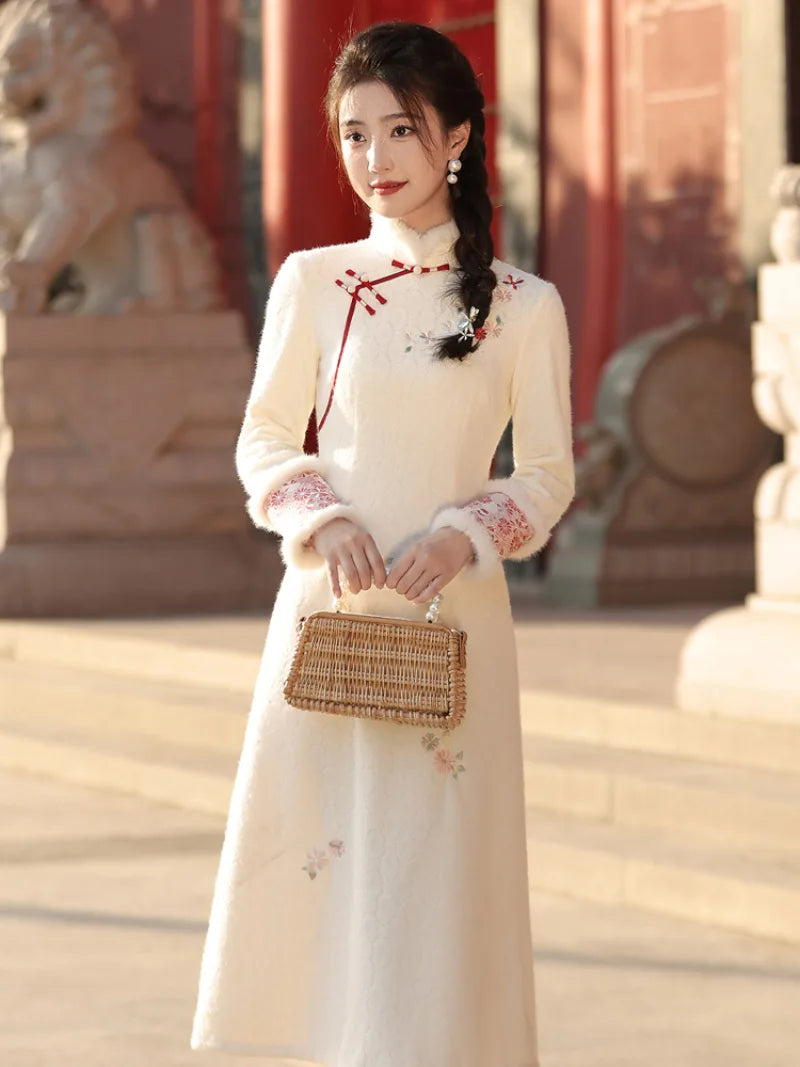 Beige cheongsam winter dress with plush collar, fleece lining and thick warm fabric in modern Chinese style