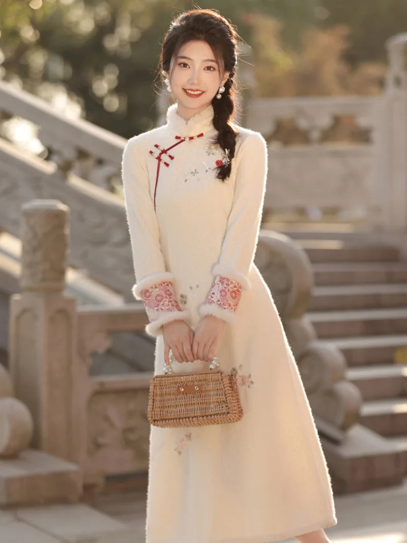 Beige cheongsam winter dress with plush collar, fleece lining and thick warm fabric in modern Chinese style