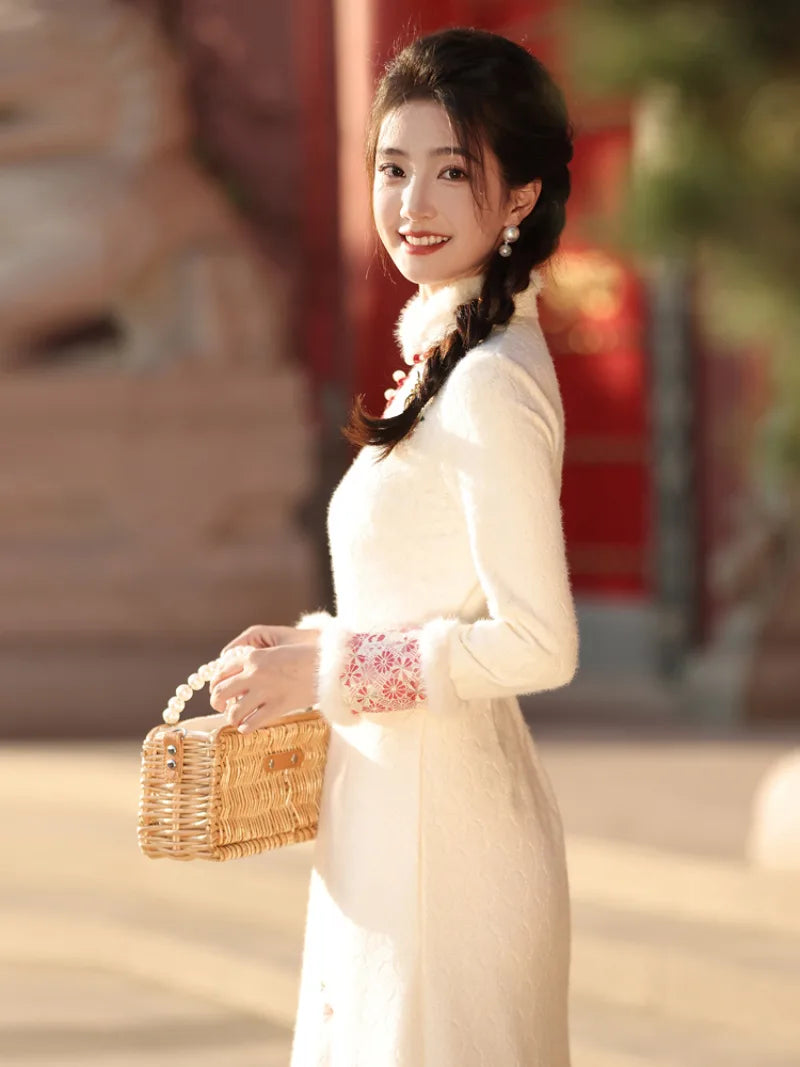 Beige cheongsam winter dress with plush collar, fleece lining and thick warm fabric in modern Chinese style