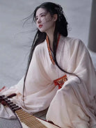 Elegant white Chinese Hanfu inspired by Warring States design, featuring straight hem robe and wide sleeves for women