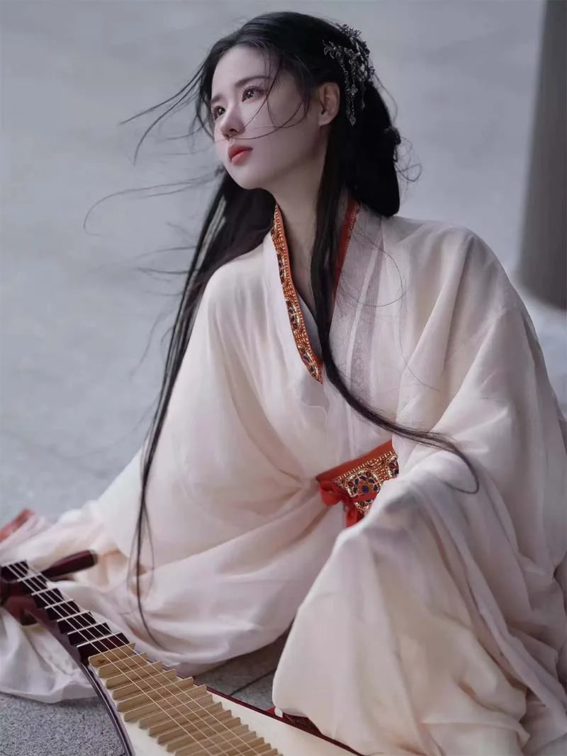 Elegant white Chinese Hanfu inspired by Warring States design, featuring straight hem robe and wide sleeves for women
