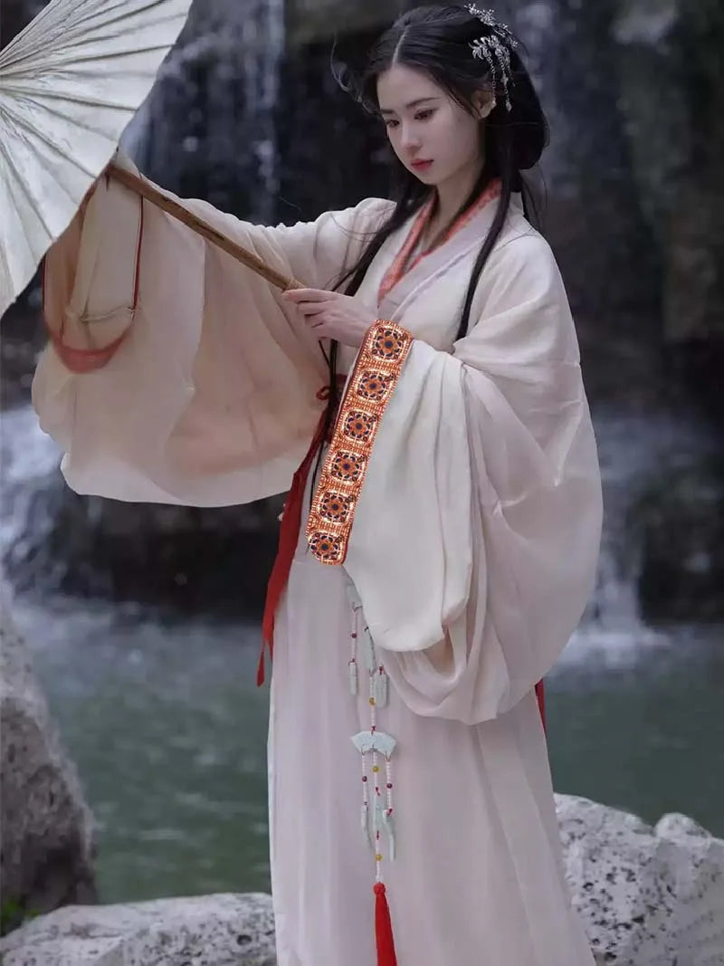 Elegant white Chinese Hanfu inspired by Warring States design, featuring straight hem robe and wide sleeves for women