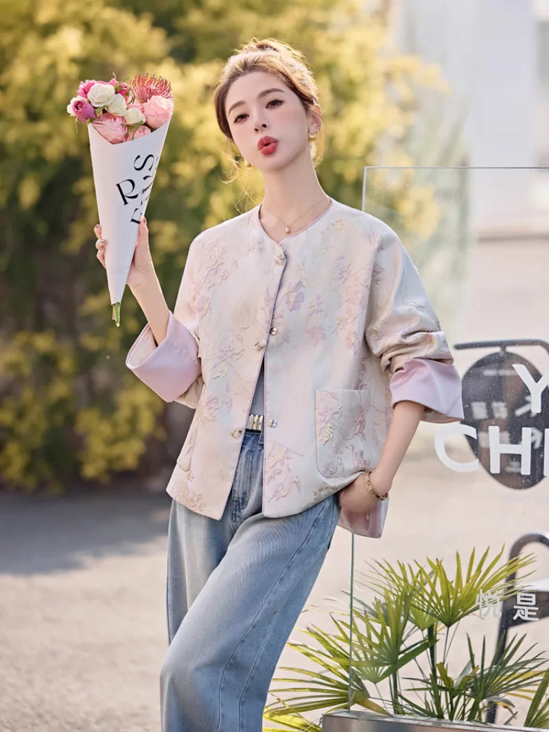 Chinese Tang Suit Jacket for women with jacquard fabric, traditional pankou buttons, modern Chinese style, elegant design