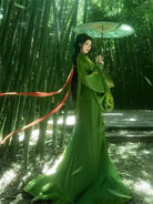 Red Chinese traditional hanfu dress inspired by Warring States robe with long trailing hem and wide flowing sleeves