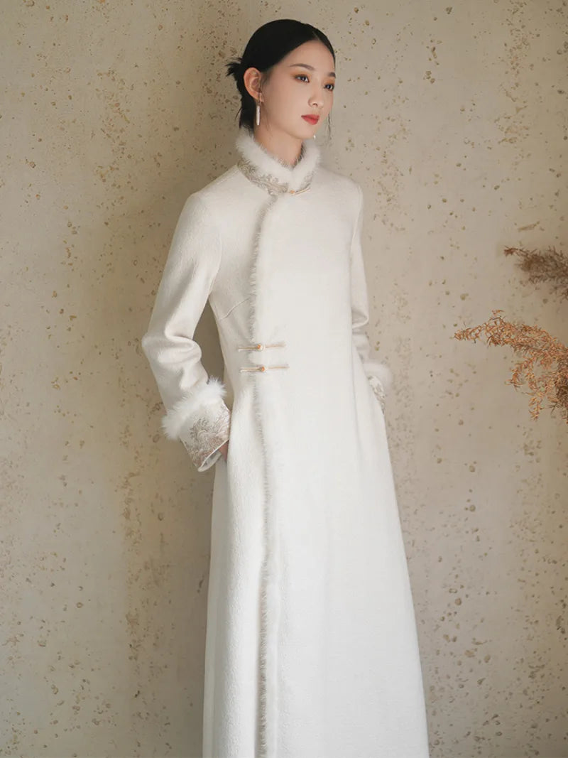 Long fleece winter qipao coat made of fine wool with full front opening and modern Chinese elegance