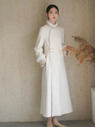 Long fleece winter qipao coat made of fine wool with full front opening and modern Chinese elegance