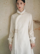 Long fleece winter qipao coat made of fine wool with full front opening and modern Chinese elegance