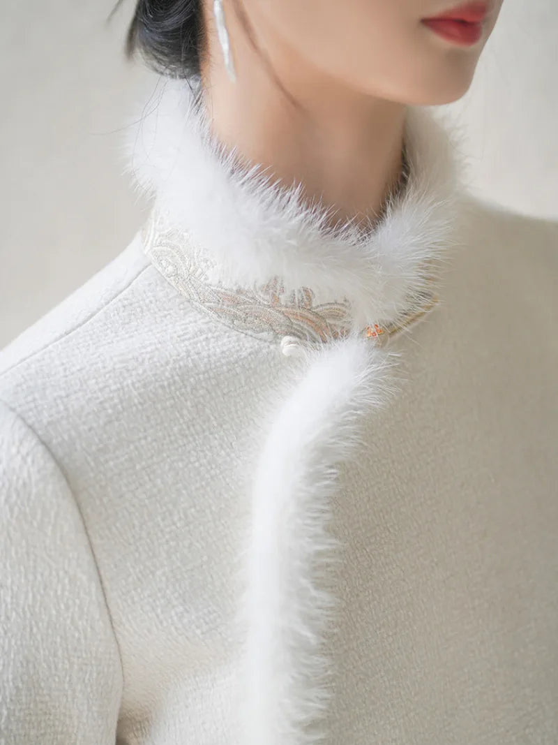 Long fleece winter qipao coat made of fine wool with full front opening and modern Chinese elegance