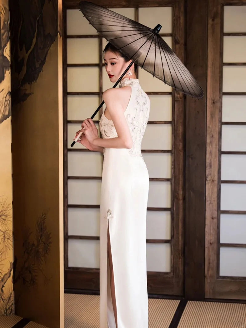 Formal dress for women featuring modern Chinese qipao halter neckline and luxury embroidery