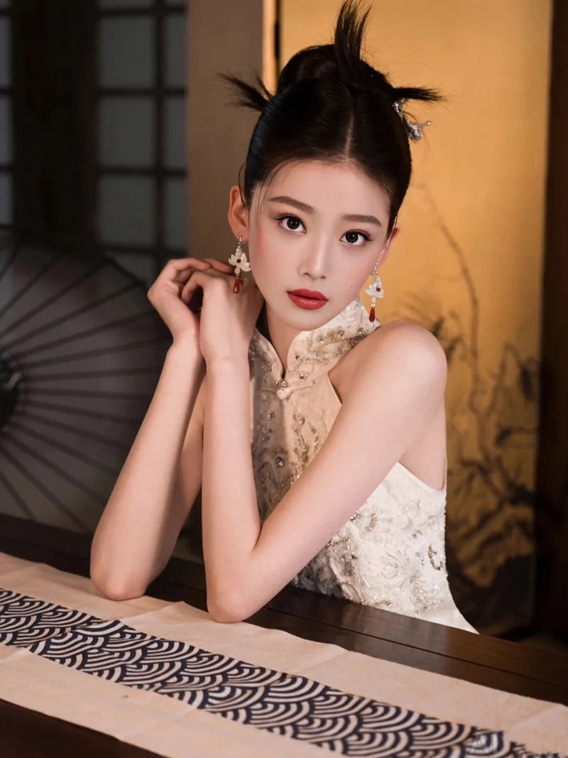 Formal dress for women featuring modern Chinese qipao halter neckline and luxury embroidery