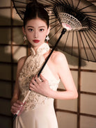 Formal dress for women featuring modern Chinese qipao halter neckline and luxury embroidery