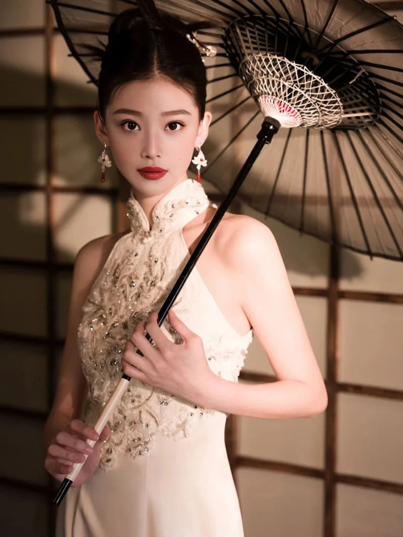 Formal dress for women featuring modern Chinese qipao halter neckline and luxury embroidery