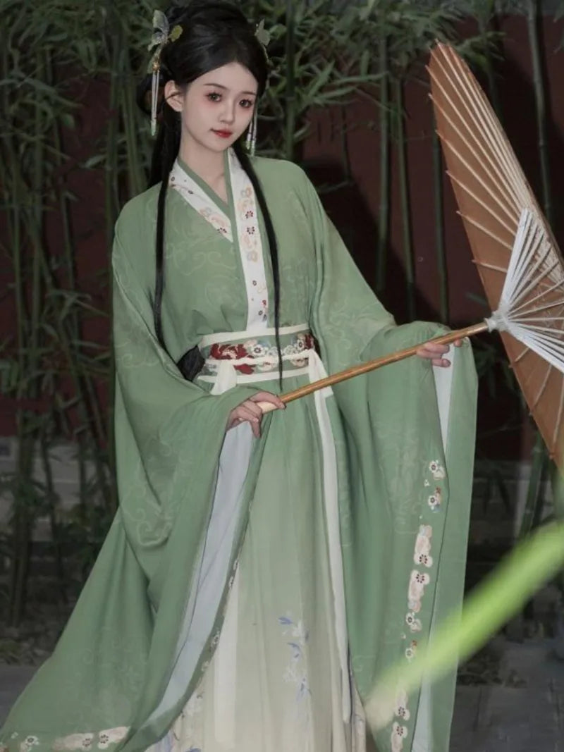 Elegant green hanfu dress with wide sleeves, flowing ancient Chinese style gown for women inspired by traditional beauty