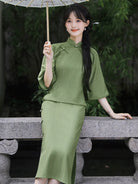Elegant green qipao dress with full front opening and floor-length vintage Chinese design