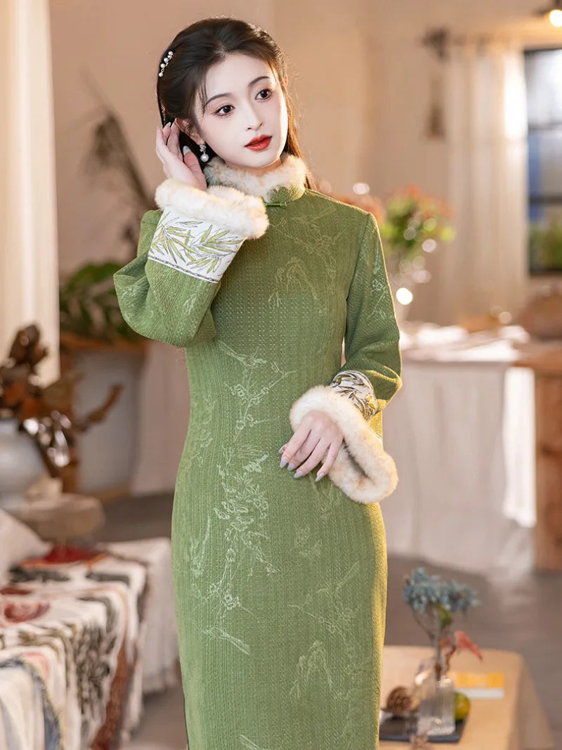 Green winter qipao with thickened fleece lining and modern vest set for warm and elegant seasonal wear