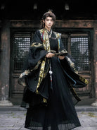 traditional hanfu male clothing featuring detailed patterns and elegant wide-sleeve cape