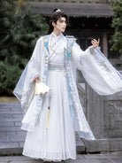 traditional hanfu male clothing featuring detailed patterns and elegant wide-sleeve cape