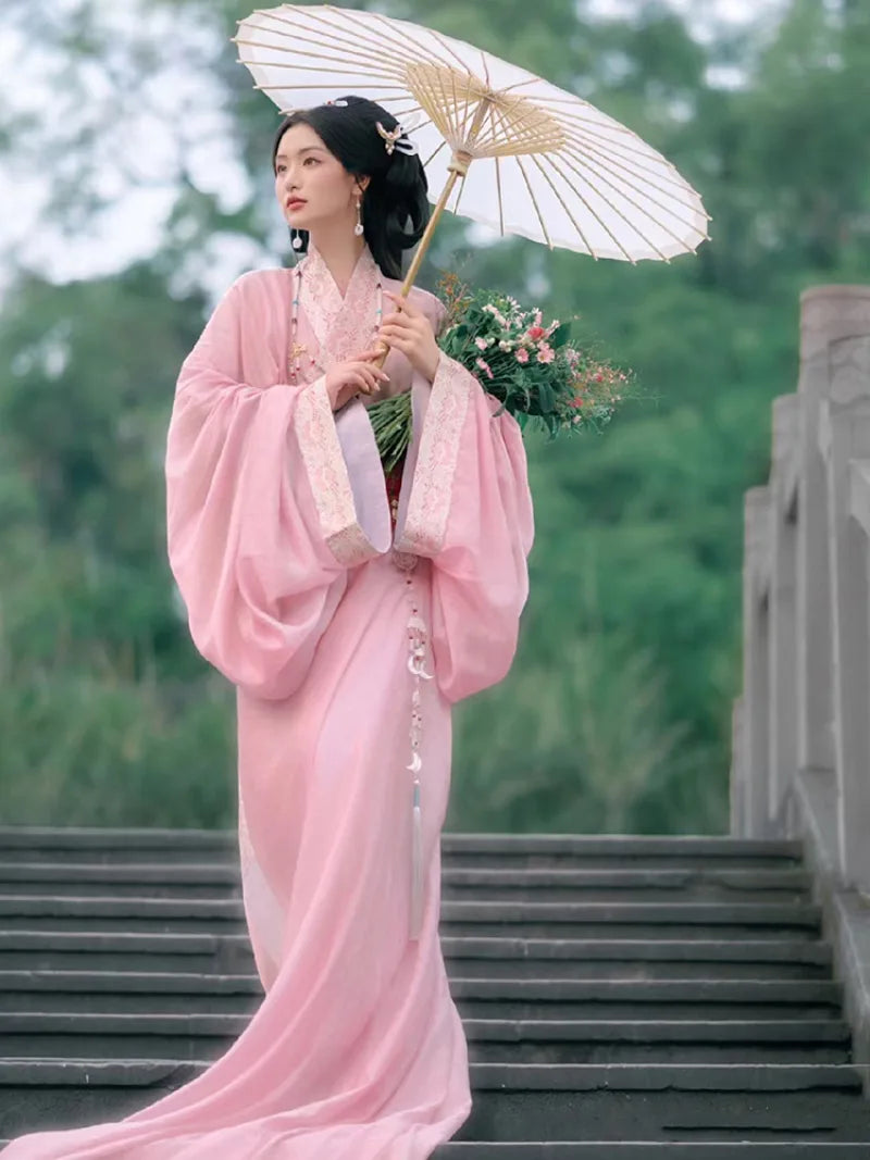 Elegant hanfu pink dress for women with wide sleeves, cross-collar, and flowing ancient Chinese summer gown design