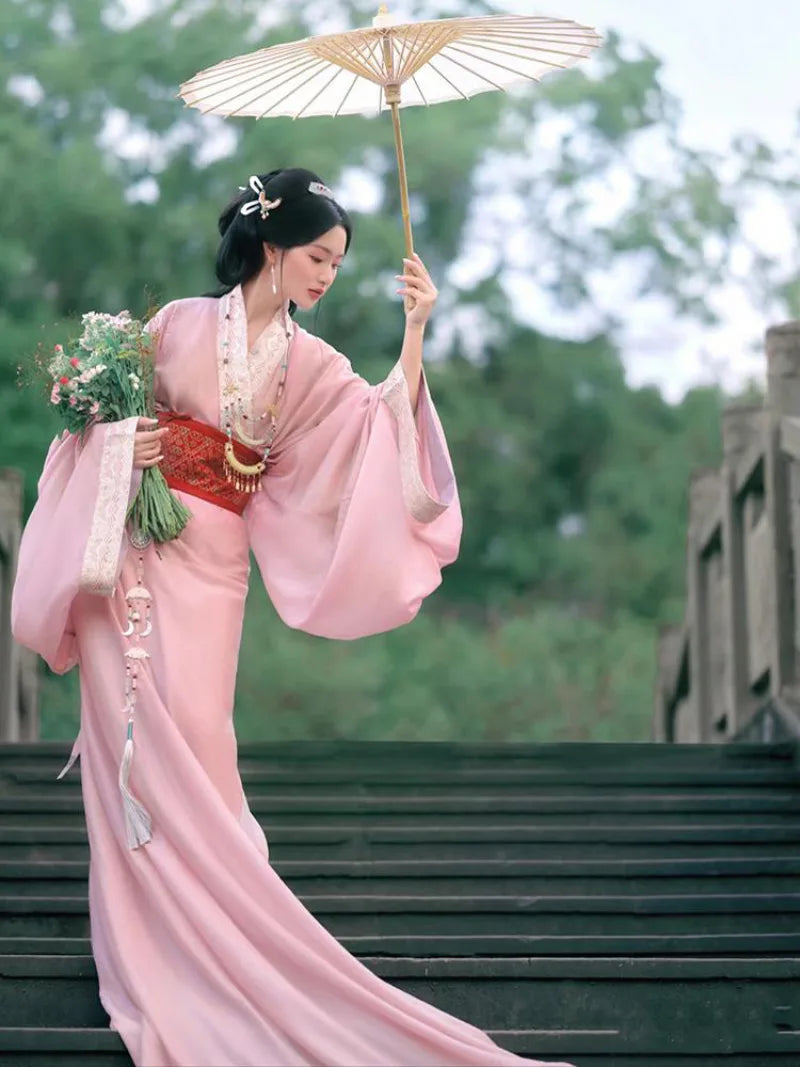 Elegant hanfu pink dress for women with wide sleeves, cross-collar, and flowing ancient Chinese summer gown design