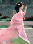 Elegant hanfu pink dress for women with wide sleeves, cross-collar, and flowing ancient Chinese summer gown design