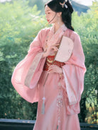 Elegant hanfu pink dress for women with wide sleeves, cross-collar, and flowing ancient Chinese summer gown design