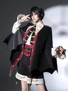 Original vampire-style Lolita outfit with gothic cape, shirt, and shorts for an elegant dark prince look