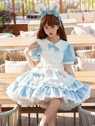 Classic black and white Lolita maid dress with lace apron and bow details, elegant original design