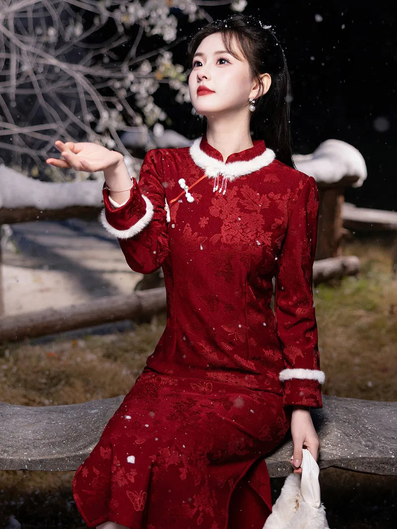 Red lunar new year cheongsam with mandarin collar and vintage button details