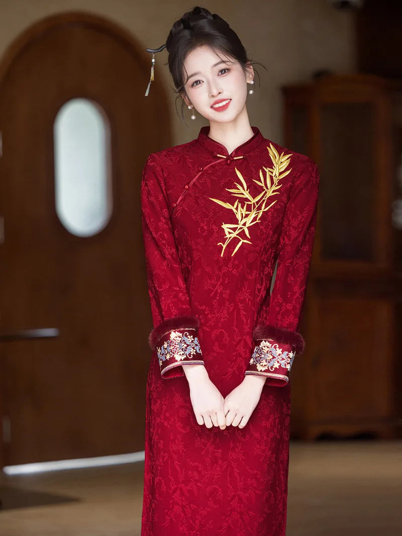 Festive Lunar New Year Qipao in red with embroidery and elegant silhouette.