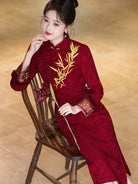 Festive Lunar New Year Qipao in red with embroidery and elegant silhouette.