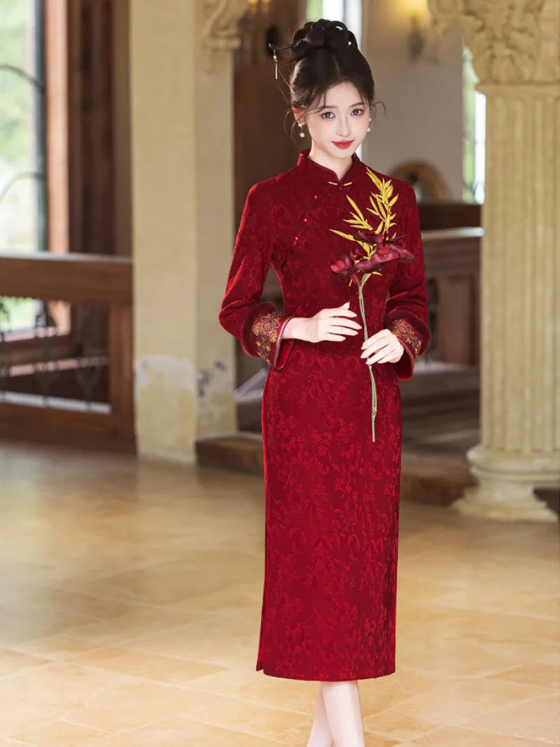 Festive Lunar New Year Qipao in red with embroidery and elegant silhouette.
