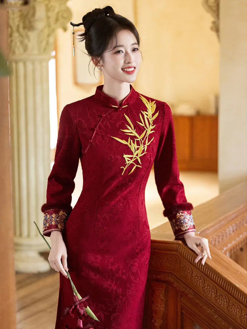 Festive Lunar New Year Qipao in red with embroidery and elegant silhouette.