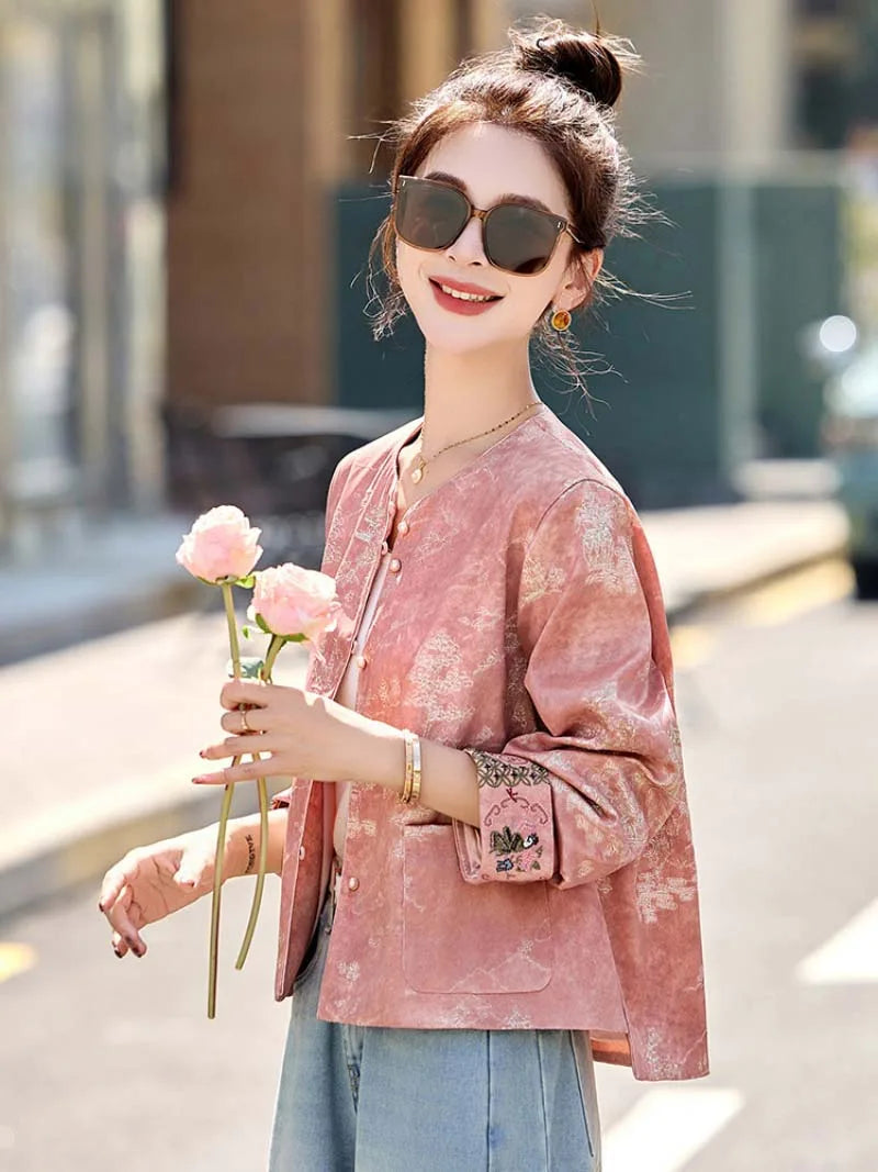 Pink Tang suit jacket with elegant embroidery and modern Chinese design for stylish women