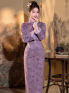Warm purple winter qipao featuring soft suede fabric and a refined modern Chinese silhouette.