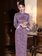 Warm purple winter qipao featuring soft suede fabric and a refined modern Chinese silhouette.
