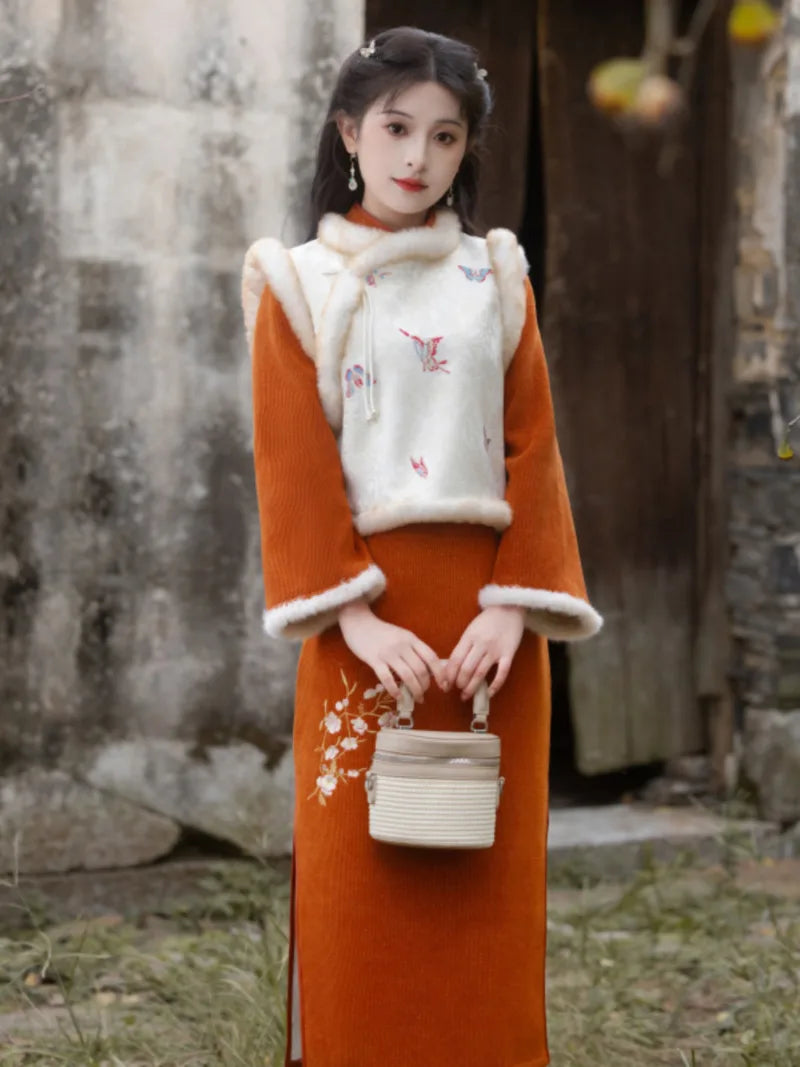 Qipao Chinese New Year embroidered winter dress for women, slim fit and elegant design.