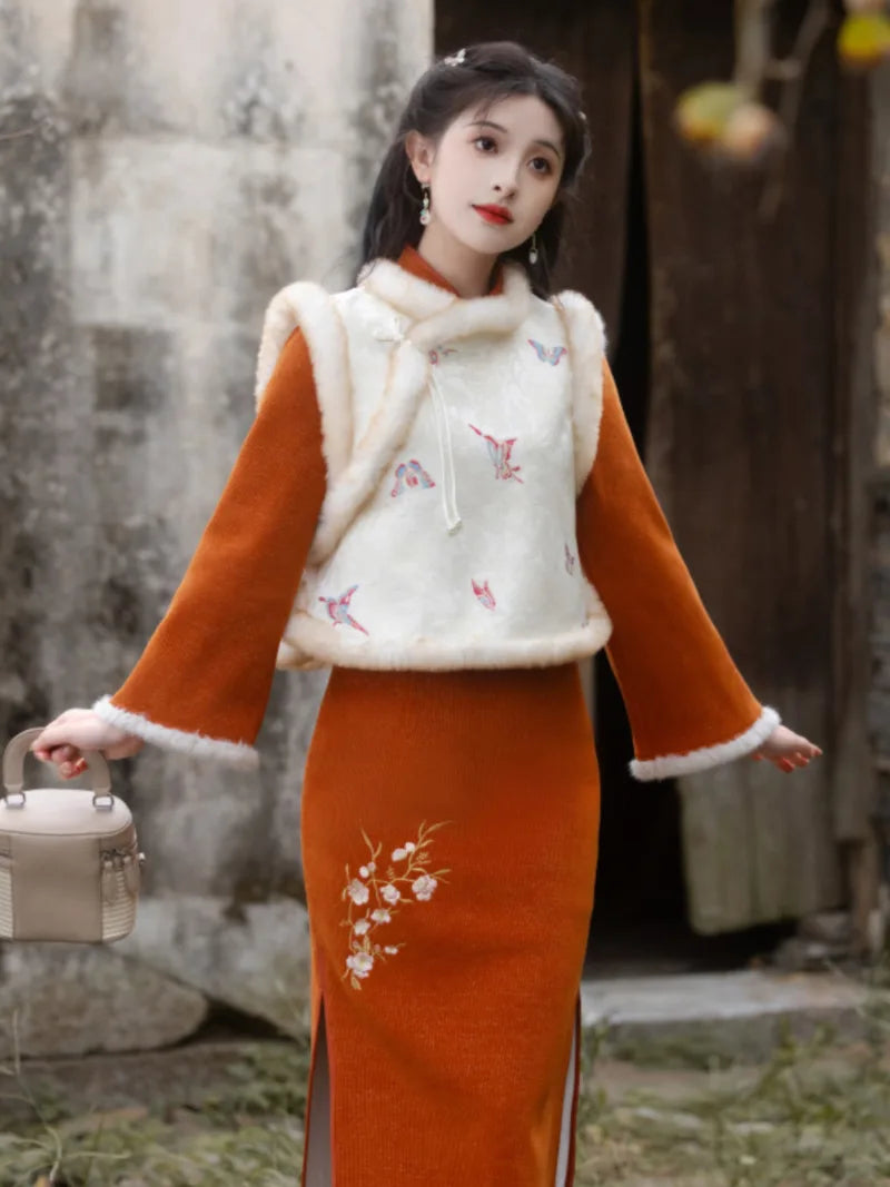 Qipao Chinese New Year embroidered winter dress for women, slim fit and elegant design.