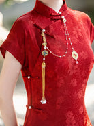 Qipao red long-sleeve elegant Chinese wedding dress with open-front vintage design for autumn and winter celebrations