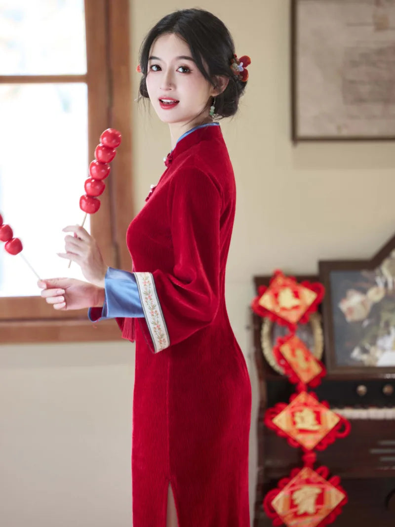 Elegant red qipao winter with long sleeves and intricate embroidery for bridal and festive occasions
