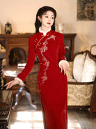 Elegant red cheongsam for new year with fitted silhouette and embroidered details for winter celebrations