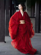 Red Hanfu Warring States robe with flowing long straight hem and cross-collar, elegant Chinese ancient style outfit for women
