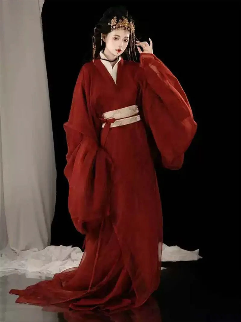 Red Hanfu Warring States robe with flowing long straight hem and cross-collar, elegant Chinese ancient style outfit for women