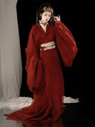 Red Hanfu Warring States robe with flowing long straight hem and cross-collar, elegant Chinese ancient style outfit for women