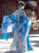 A light, elegant Tang-style dress with detailed stitching and airy fabric perfect for warm seasons.