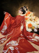 Tang Dynasty women's clothing hanfu with wide sleeves and phoenix imagery