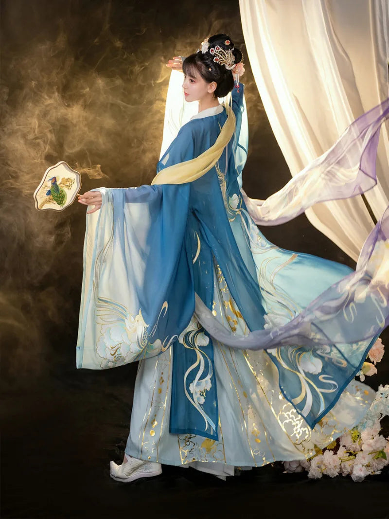 Tang Dynasty women's clothing hanfu with wide sleeves and phoenix imagery