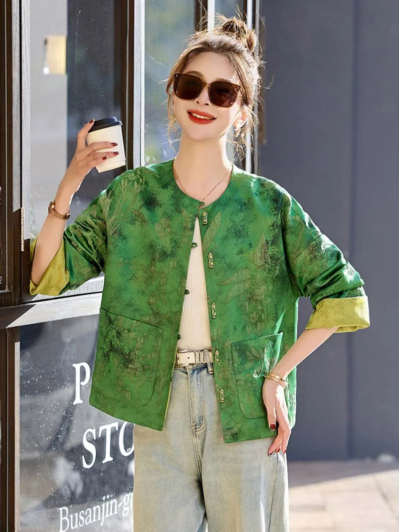 Elegant reversible Tang Suit for women featuring jacquard fabric, classic Chinese button design, and modern fashion silhouette.