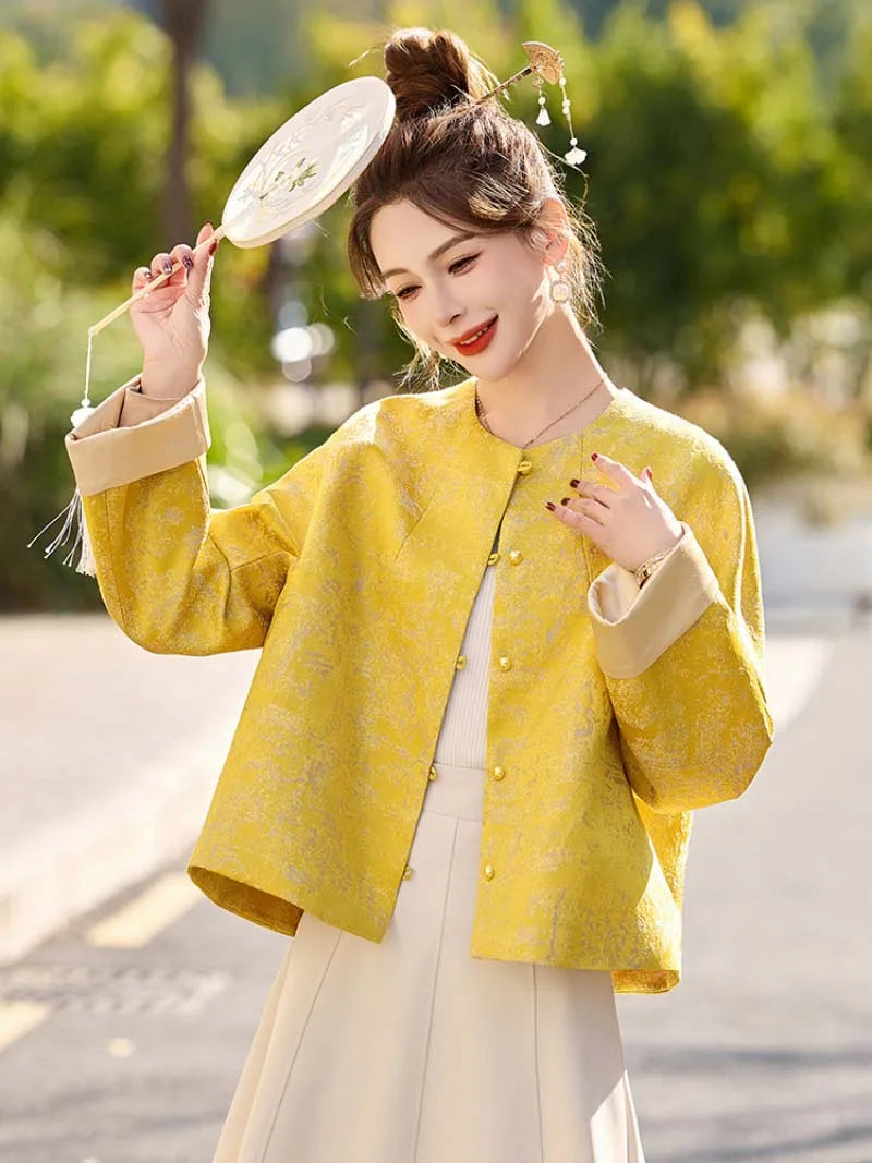 Yellow jacquard tang suit featuring round collar, delicate hem drape and comfortable wide-sleeve design for women